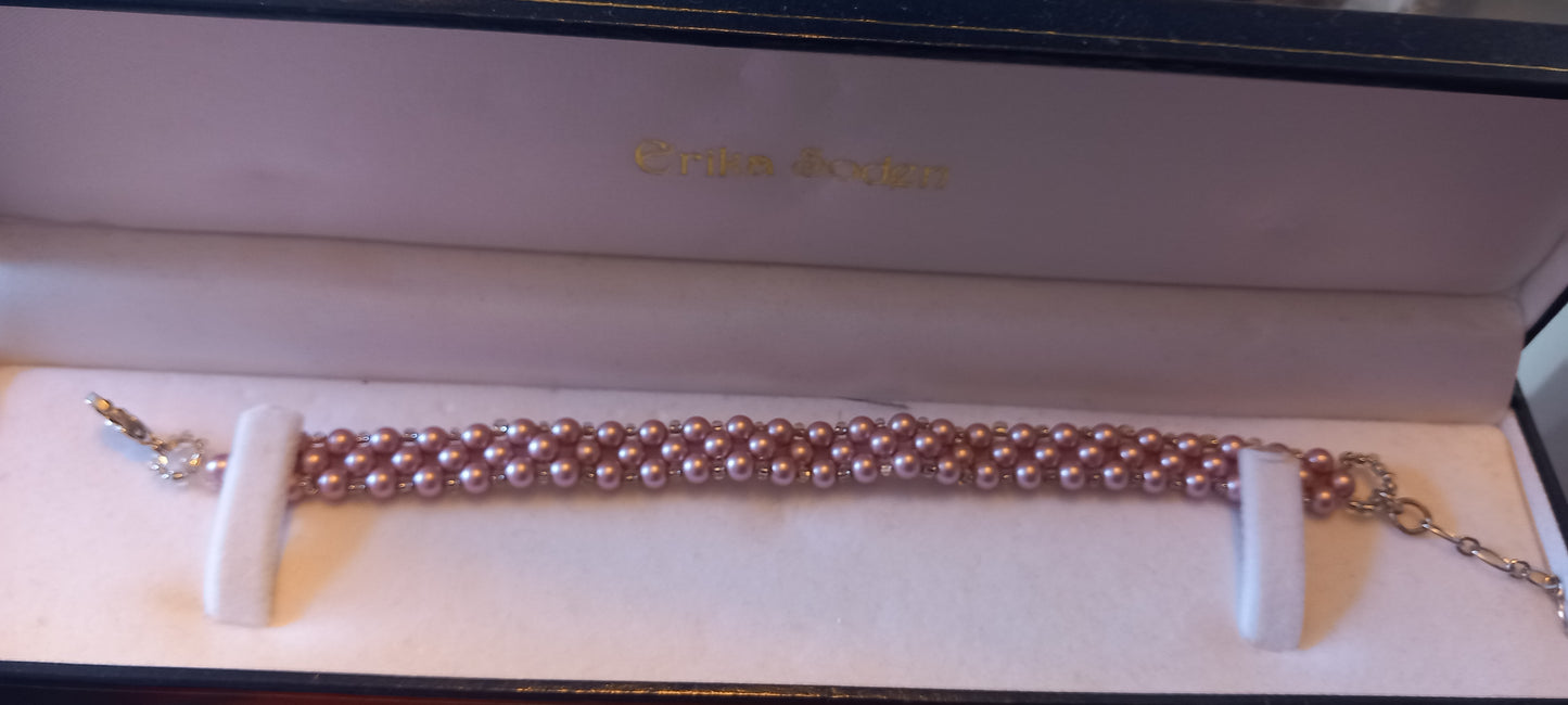 Delicate Pink Pearl Bracelet that captures the soft romance of blush-toned pearls. Each lustrous pink pearl is carefully selected for its beautiful colour and smooth finish, creating a sophisticated piece that adds a touch of grace to any outfit.