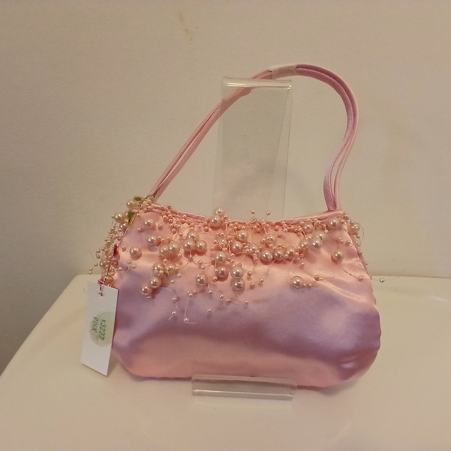 Baby pink bag. small enough for a phone, keys bankcard and lipstick