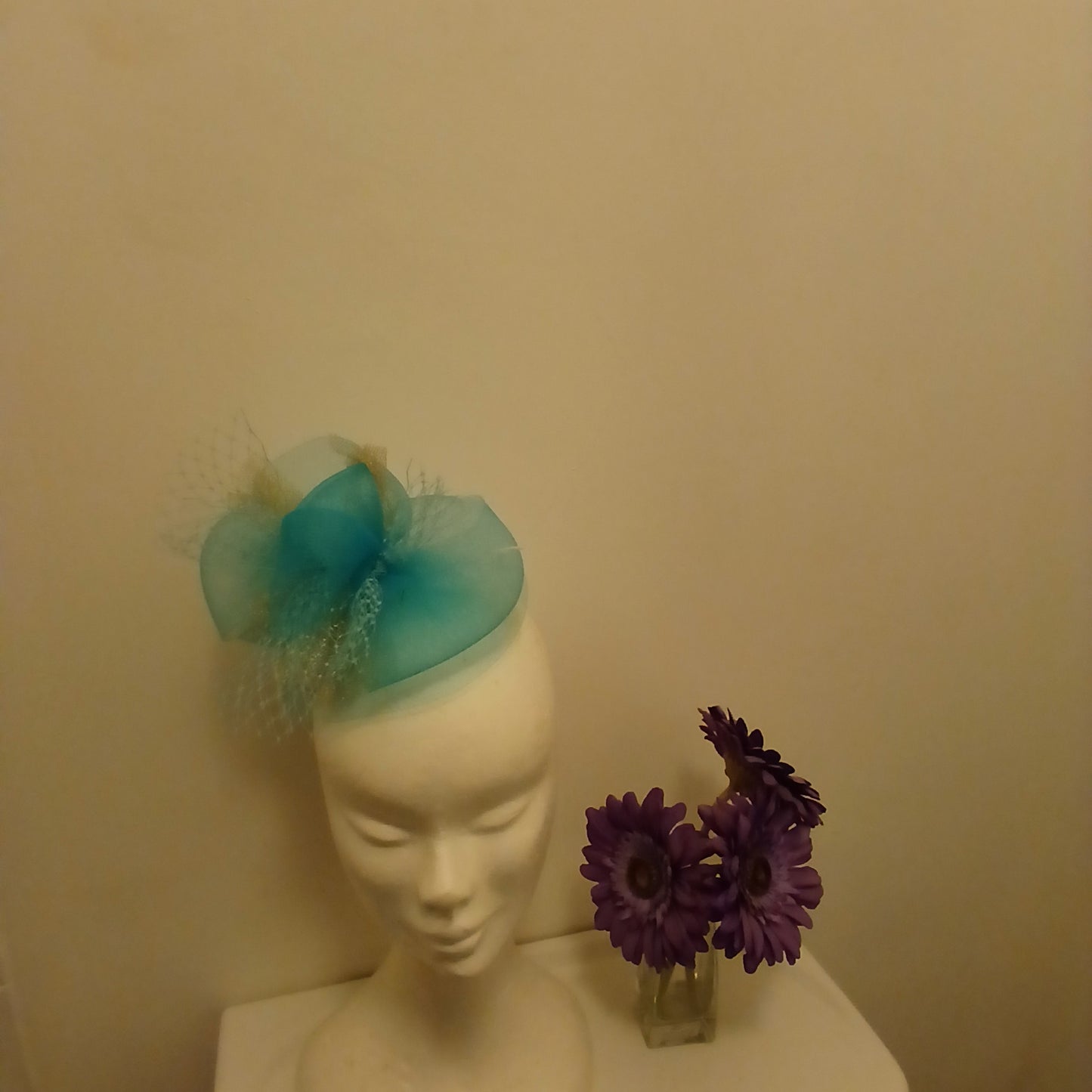 Fascinator rama in turquoise bow style turquoise and gold