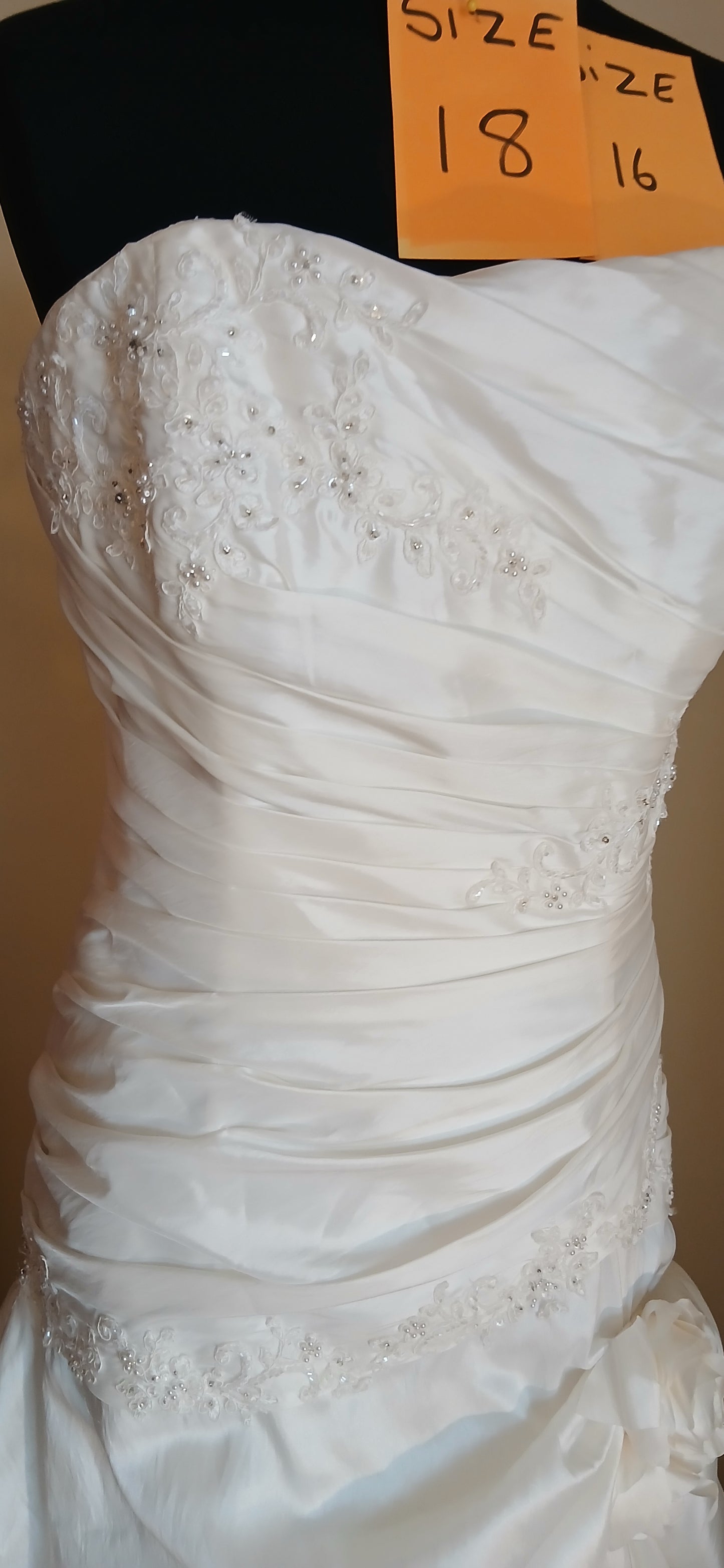 beautiful Rebecca wedding dress with jewelled bodice ruched to hip, corset back