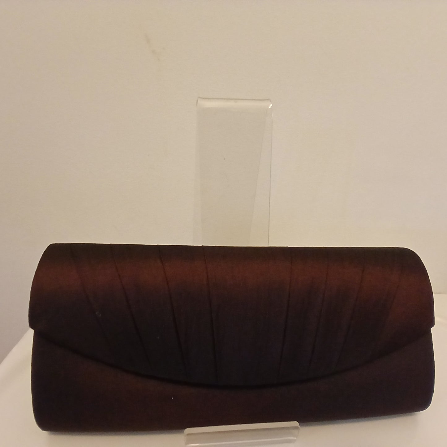 Brown satin bag with pleated detail and cord strap