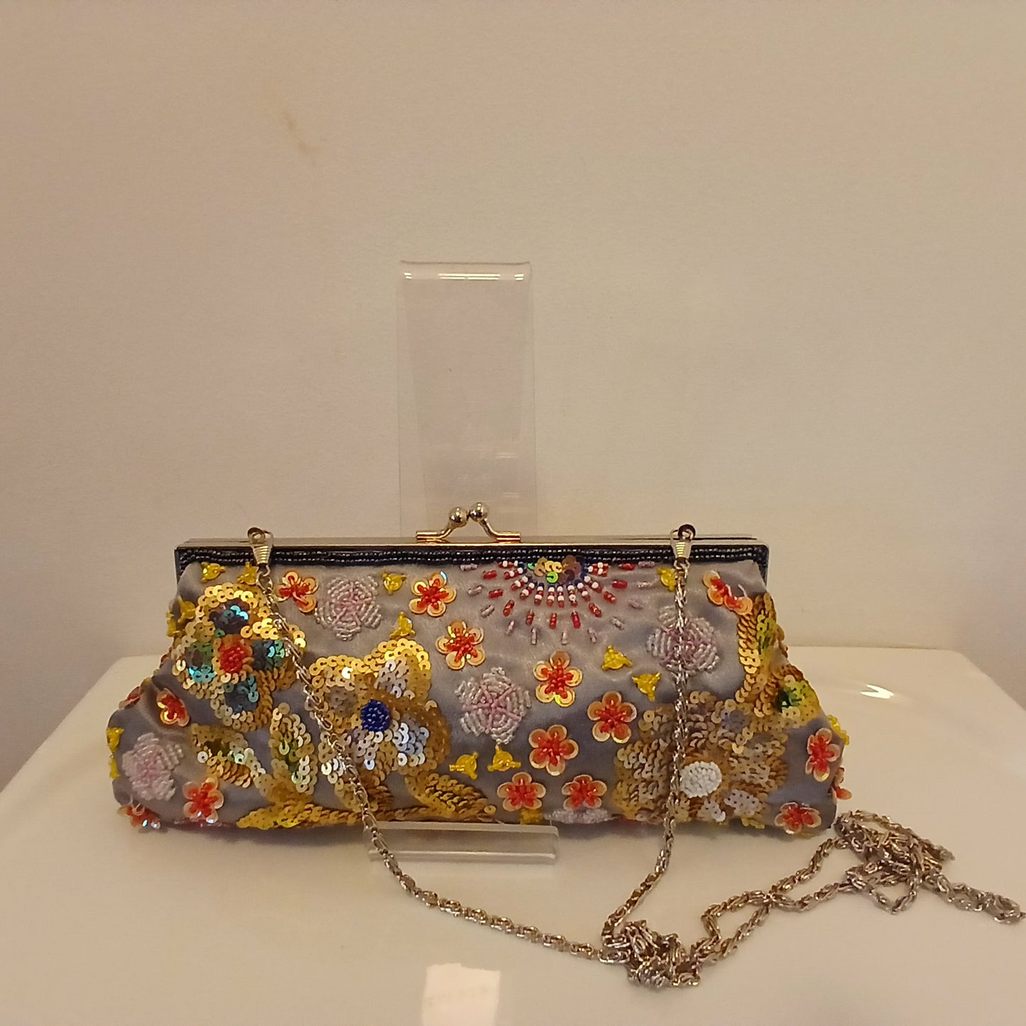 Grey bag with sequined flowers