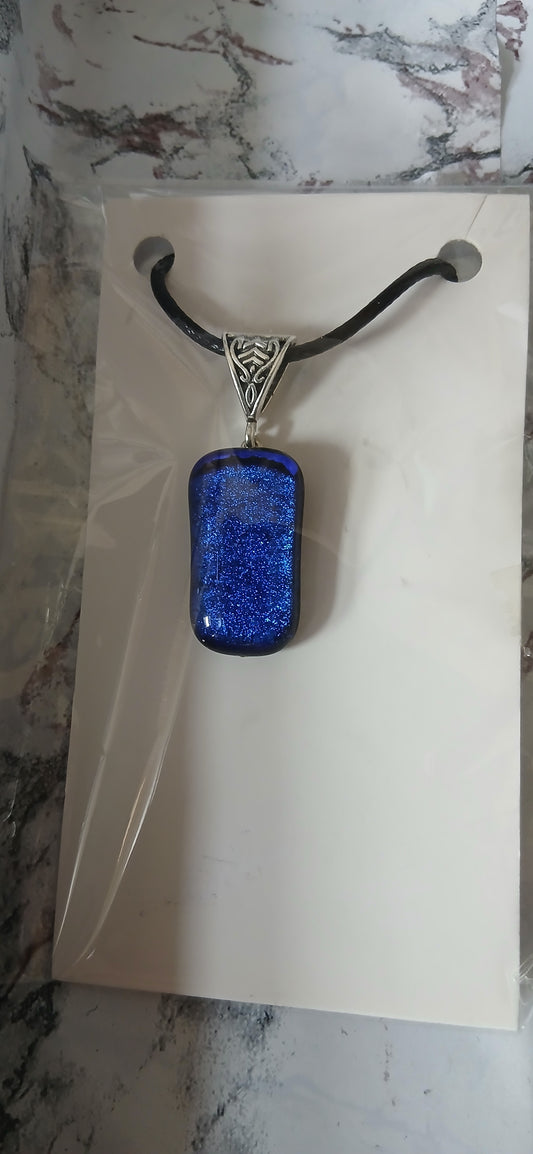 Perfect as an affordable gift, a starter piece for dichroic glass lovers, or simply a beautiful addition to your jewellery collection. Despite its modest price, this pendant delivers the same stunning dichroic glass effects found in higher-priced pieces, making it exceptional value for handcrafted artisan jewellery.