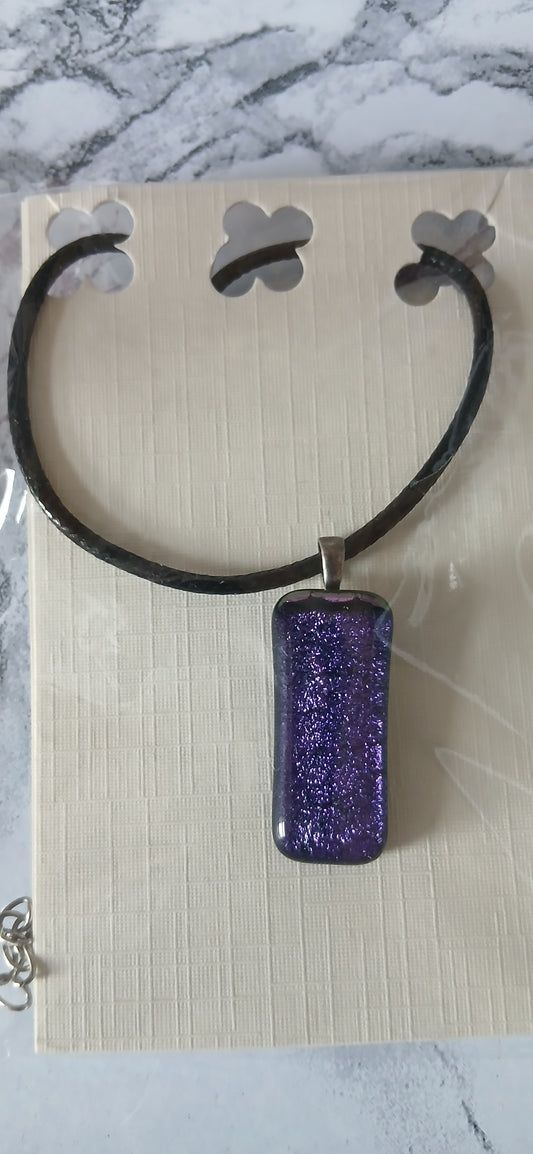 Purple dichroic glass pendant on cord featuring rich royal purple tones with colour-shifting properties"