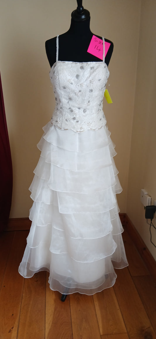  Wedding dress Chloe. This classic A-line gown features a flowing skirt and a beautifully beaded bodice with delicate spaghetti straps. 