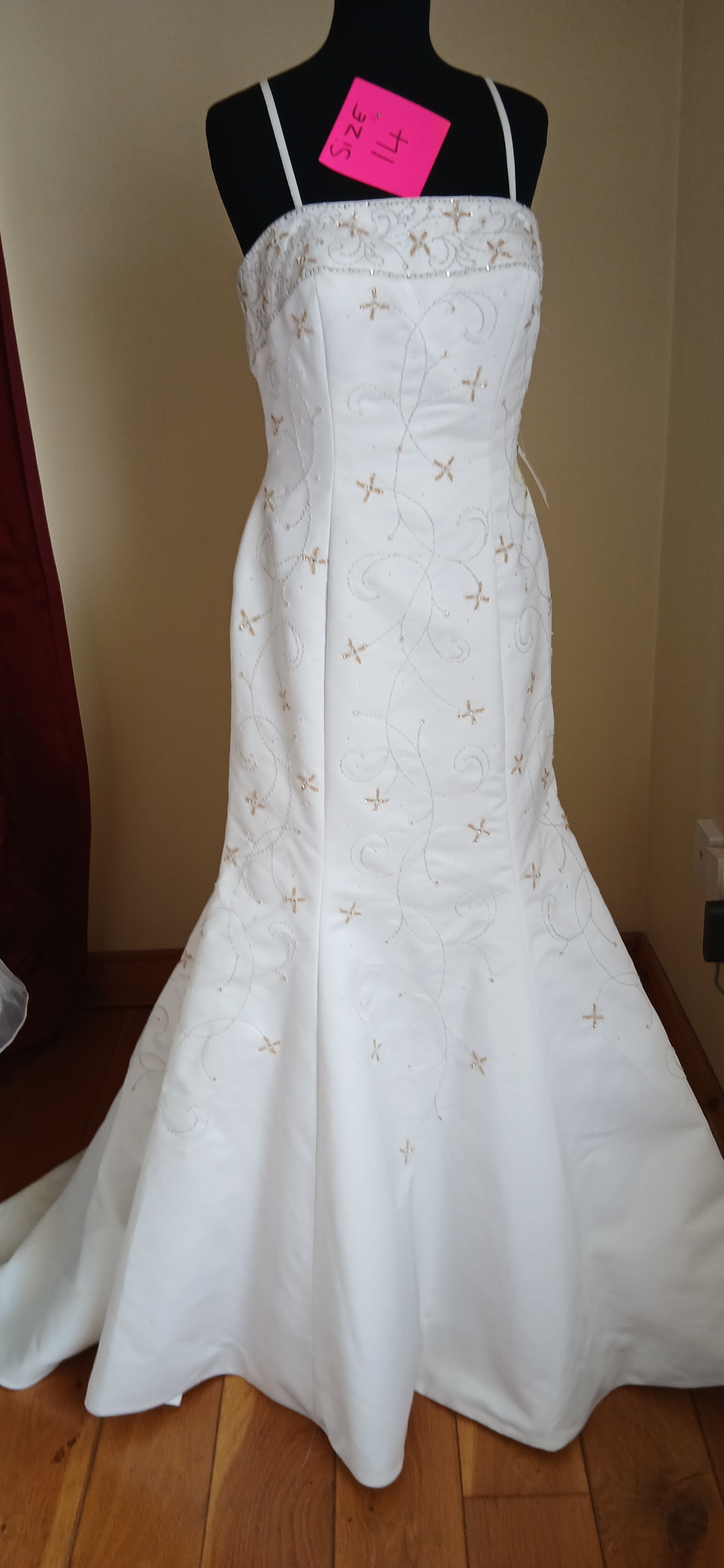  It's not just a dress, it's a statement of sophistication and grace. Perfect for the bride who wants to add a touch of classic charm to her special day.