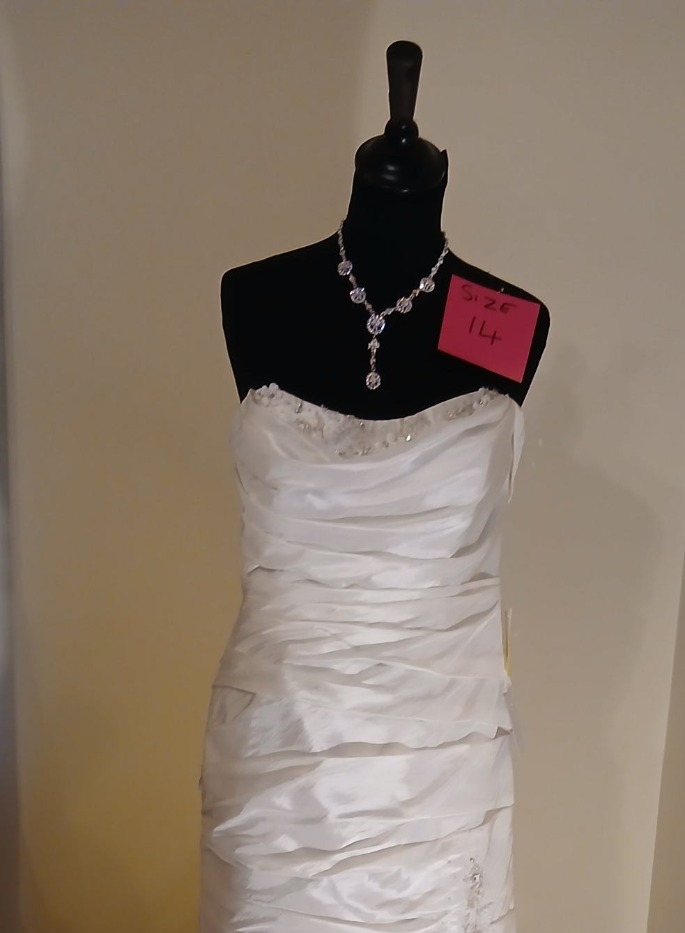 fitted dress with beautiful beading at  bust 