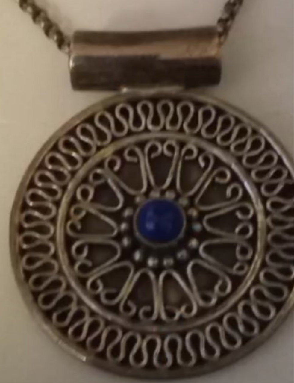 close up of silver design and lapis stone
