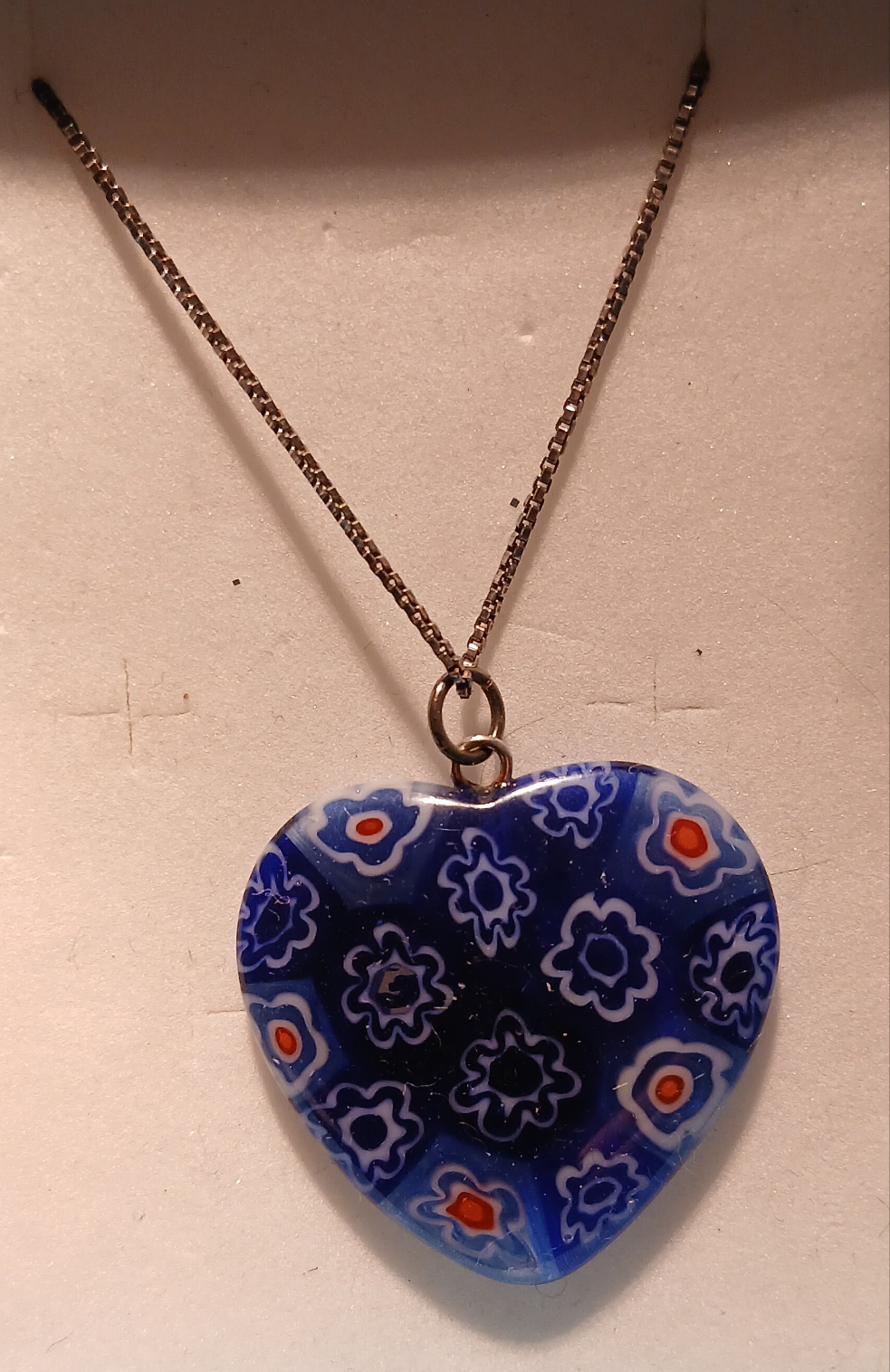 Millefiori heart pendant featuring intricate thousand flowers glass pattern on sterling silver chain, romantic Italian artisan jewellery"