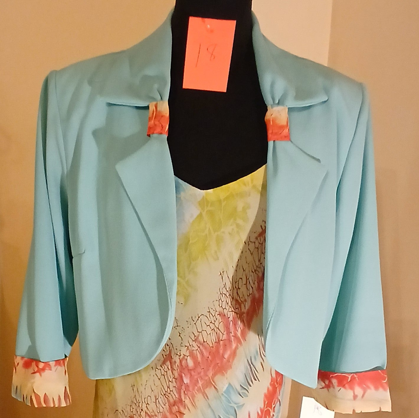 colourful bias cut mid length dress with colourful complimenting  jacket