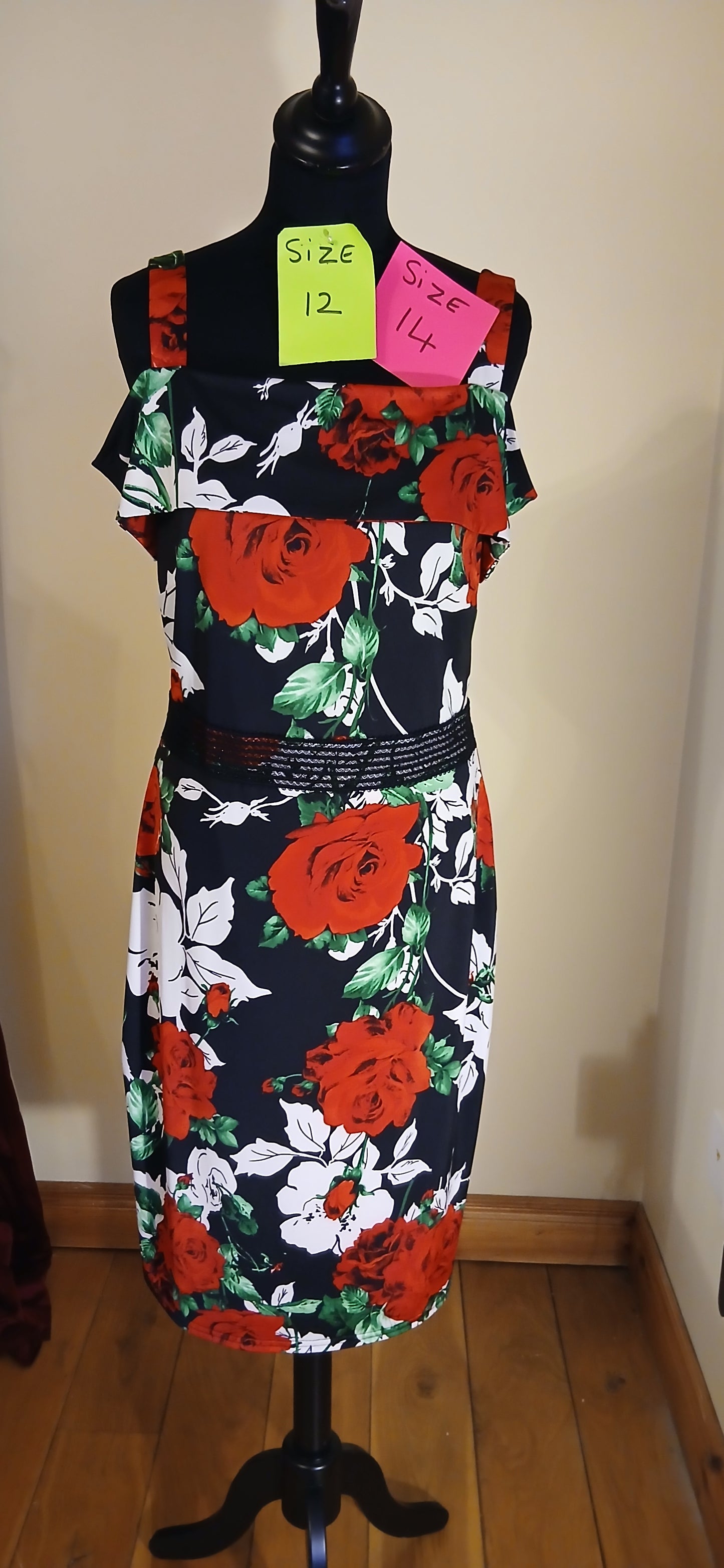 Beautiful  roses dress  in sizes 12, 14 and 16 