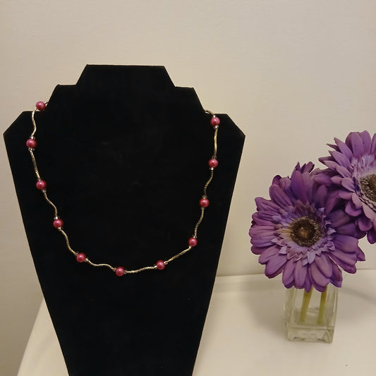 Sterling Silver Pink Necklace. Crafted with high-quality sterling silver tube beads, this necklace exudes a classic style that's sure to turn heads. 