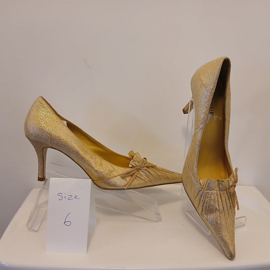 Gold  shoes size 6