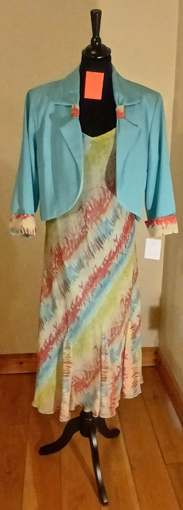 colourful dress and  lightweight jacket