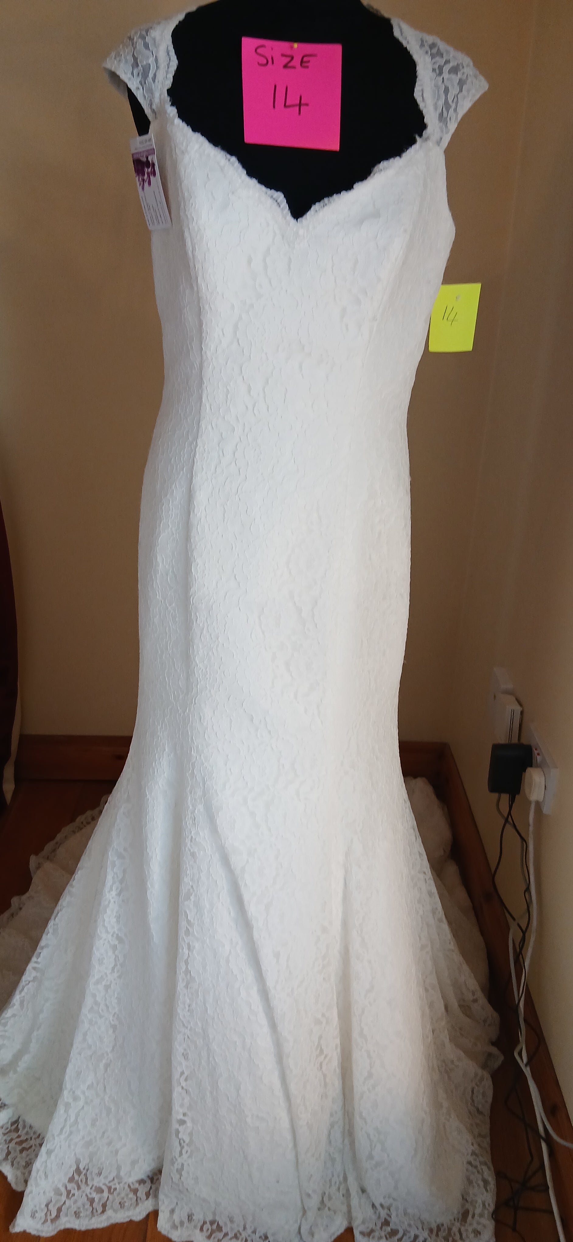 Step into the elegance of the past with our Wedding dress Ella. This exquisite piece features delicate illusion lace on back that The drop waist design adds a touch of elegance, while the intricate lace&nbsp; fabric weave a spell of enchantment