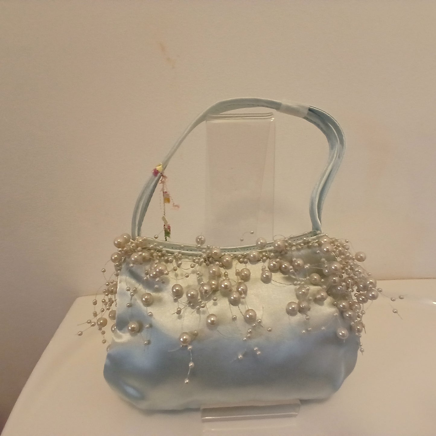 Baby blue bag. small enough for  a phone, keys bankcard and lipstick