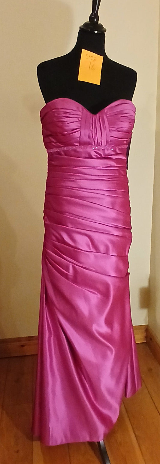  size 16 cerise pink satin dress. This stunning piece features a corset back design, accentuating your figure while providing a comfortable and secure fit. The beaded detail at the bust adds a touch of sophistication, making it a versatile dress for both casual and formal occasions