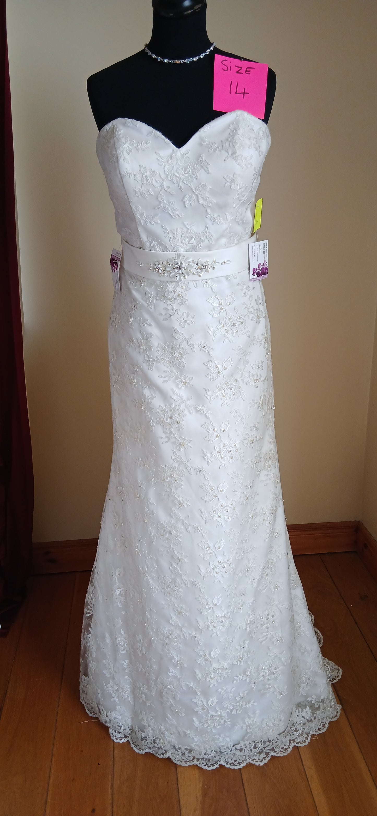 Wedding dress Courtney is a stunning ivory lace fitted gown, size 14, 