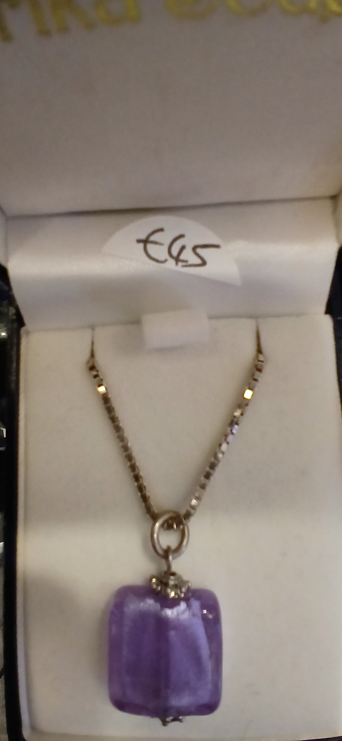 Experience the elegance and sophistication of our Purple and Sterling Silver Necklace and Earrings Set. This set features a beautiful purple necklace with a sterling silver chain, complemented by a pair of earrings with sterling silver earwires. Perfect for those who appreciate the finer things in life.