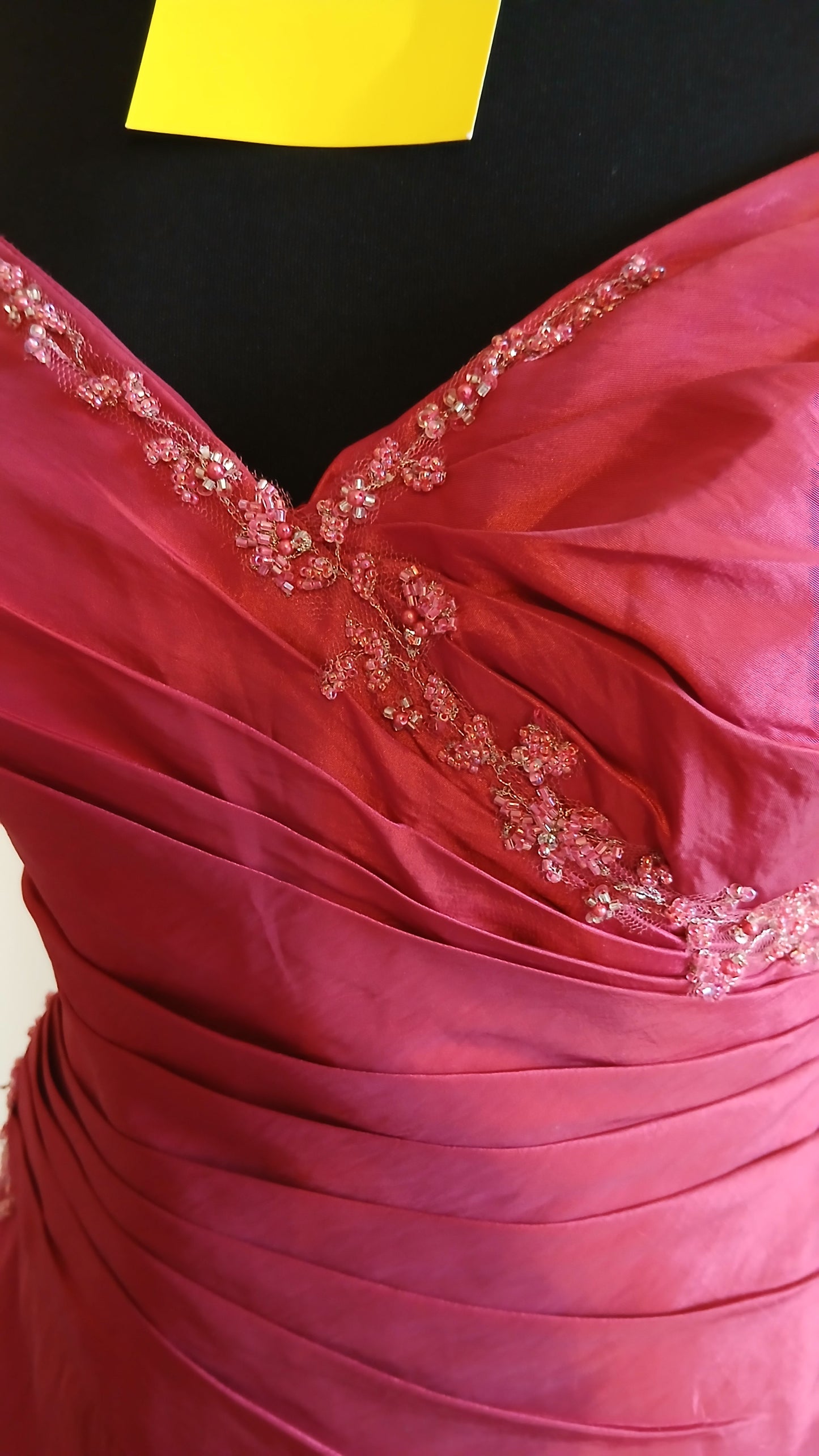 "beading detail on cerise taffeta dress"