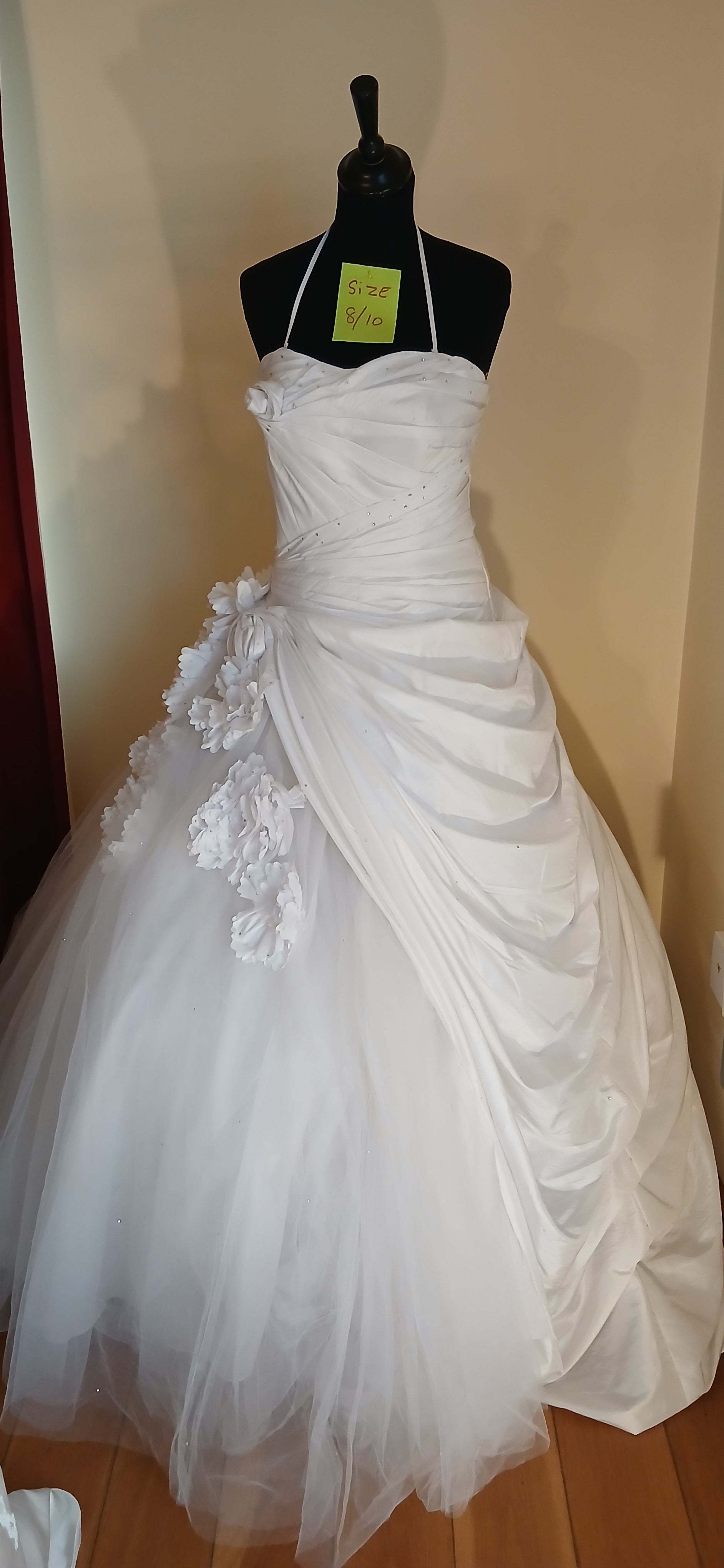  Wedding dress Princess White in size 10. This exquisite ballgown features a very full skirt that will make you feel like a true princess,
