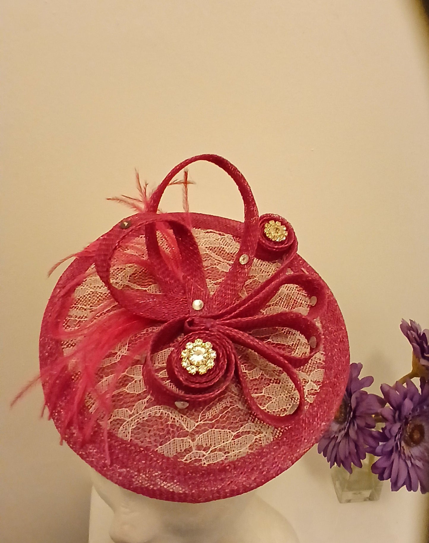 Facinator  Innga in  cerise with white lace and diamonte crystal centrepiece