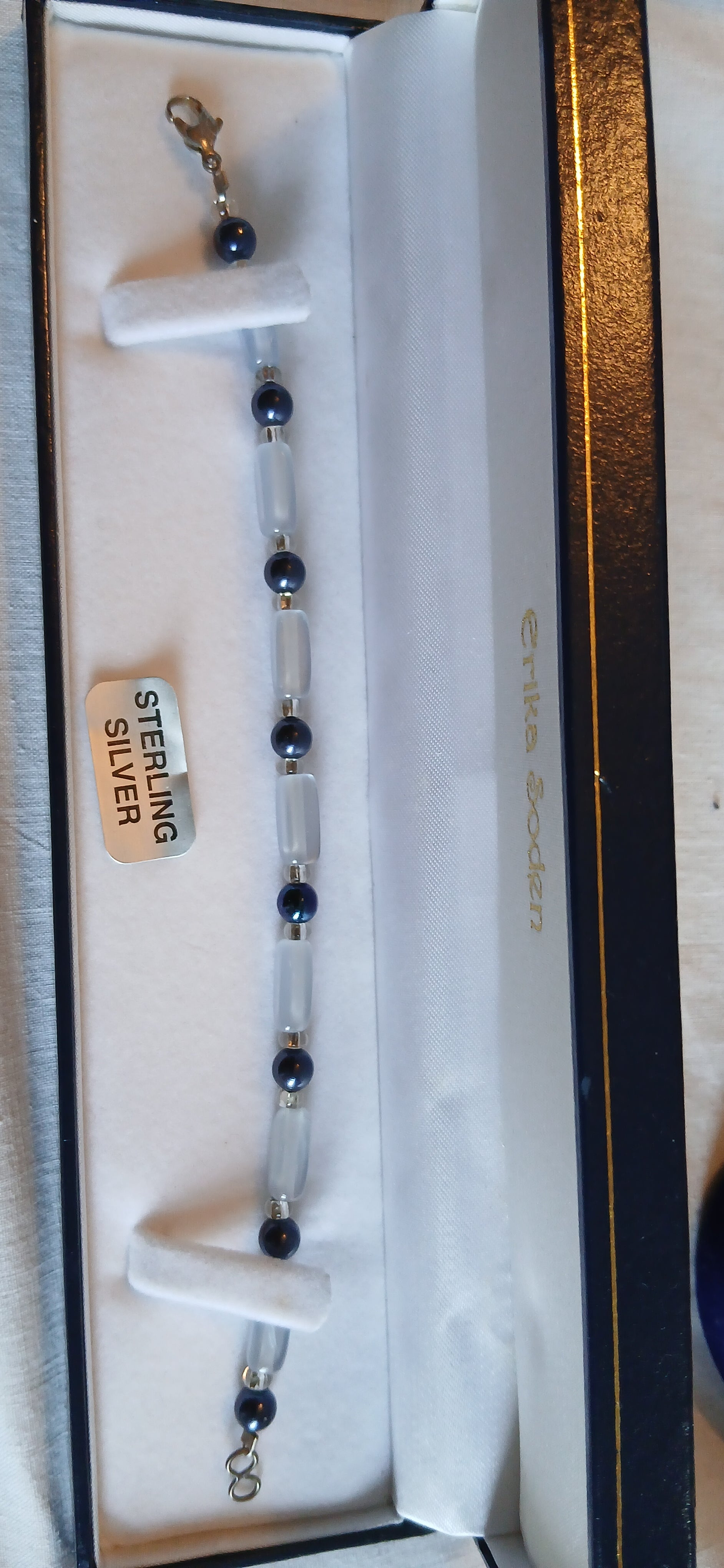 Discover the serene beauty of this Blue Grey Beaded Bracelet that perfectly captures the calming essence of ocean mist and stormy skies. This sophisticated piece features carefully selected beads in complementary shades of blue and grey, creating a harmonious blend that's both modern and timeless.

The cool-toned palette makes this bracelet incredibly versatile - it pairs beautifully with denim for casual days, complements professional attire, and adds a subtle pop of color to neutral outfits. The soothing 