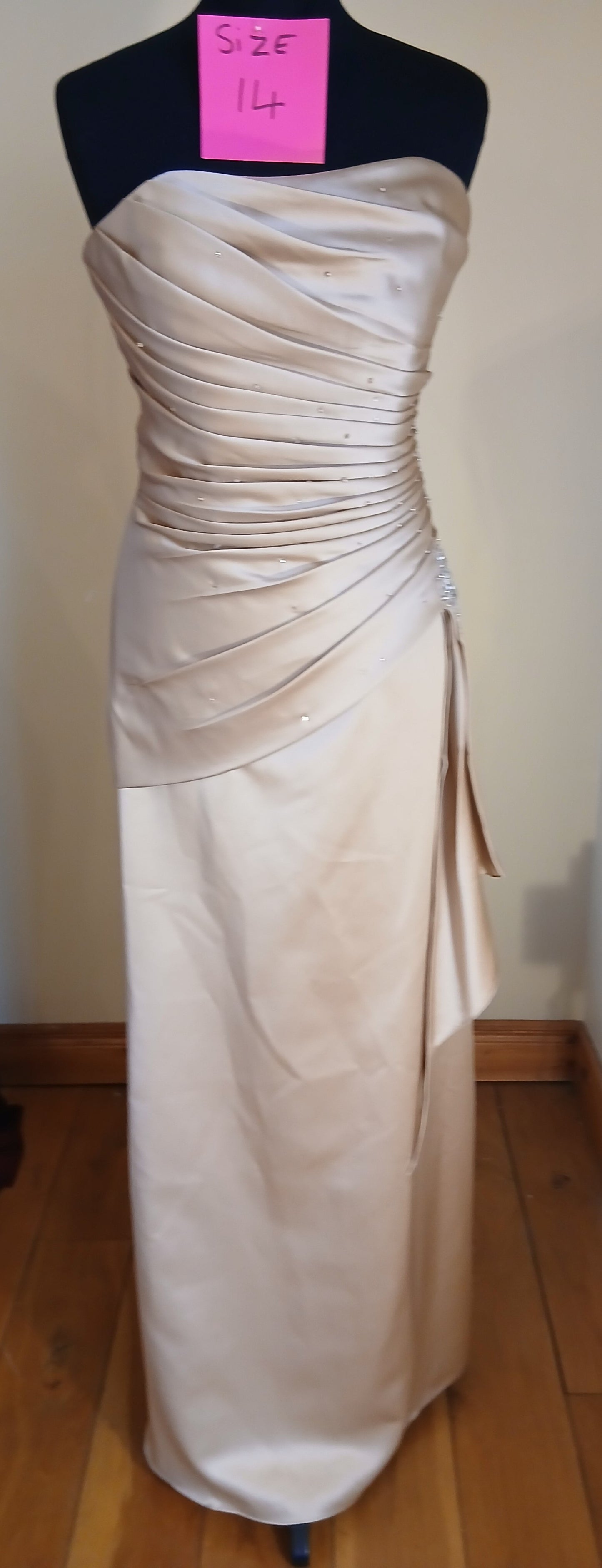 beautiful gold dress with ruched detail to hip very slimming jewelled motif at hip