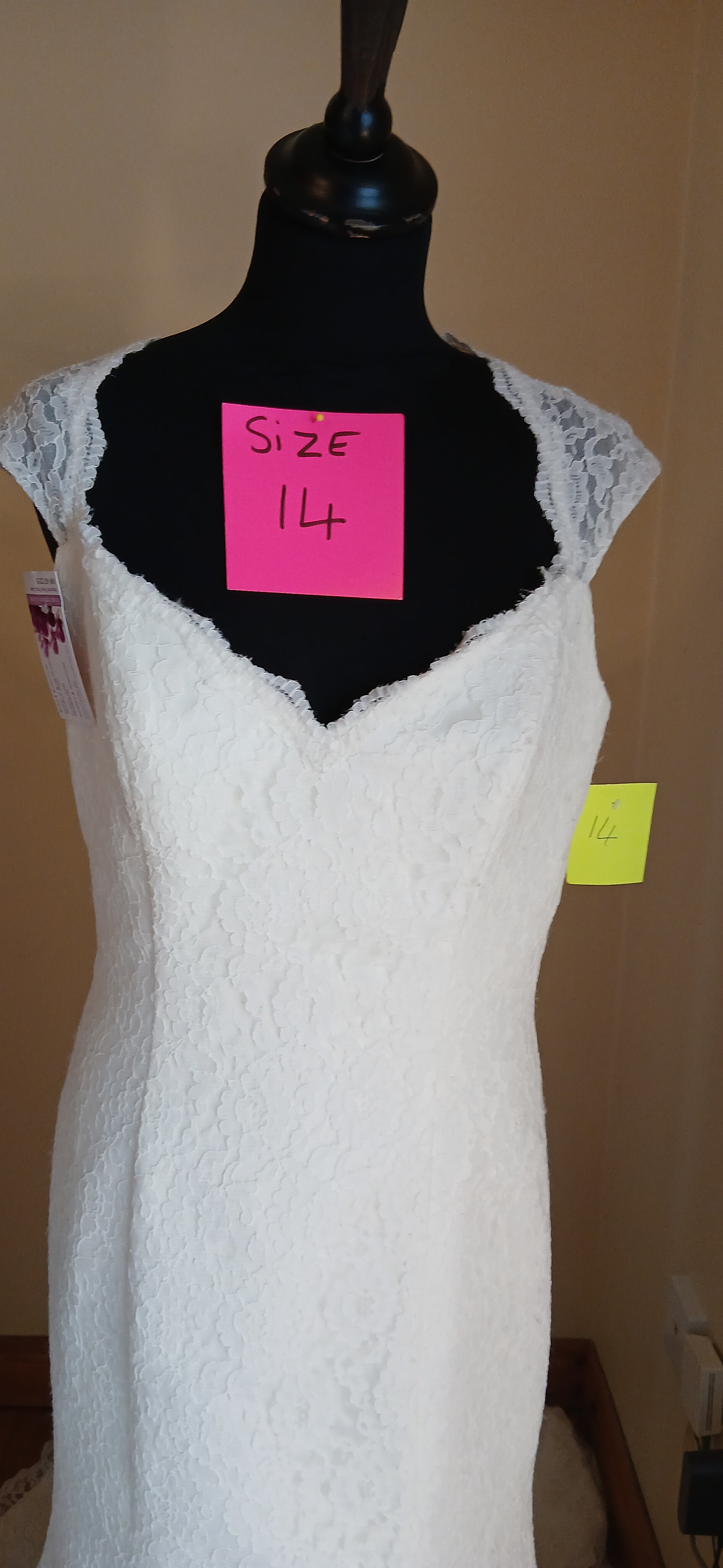 all over lace wedding dress with pretty cap sleeves and scalloped neckline