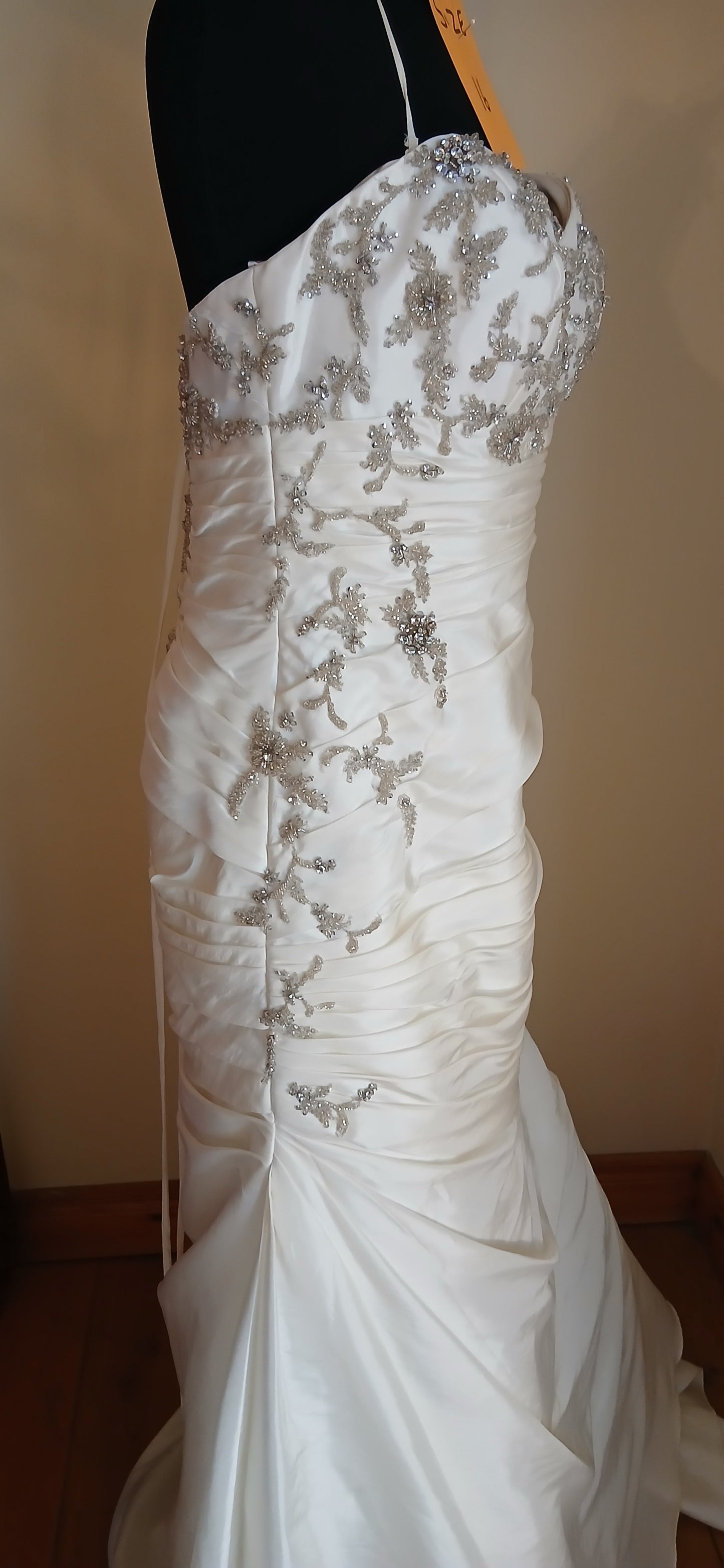 side view of wedding dress Laura size 16, gorgeous beaded detail and jewelled motifs