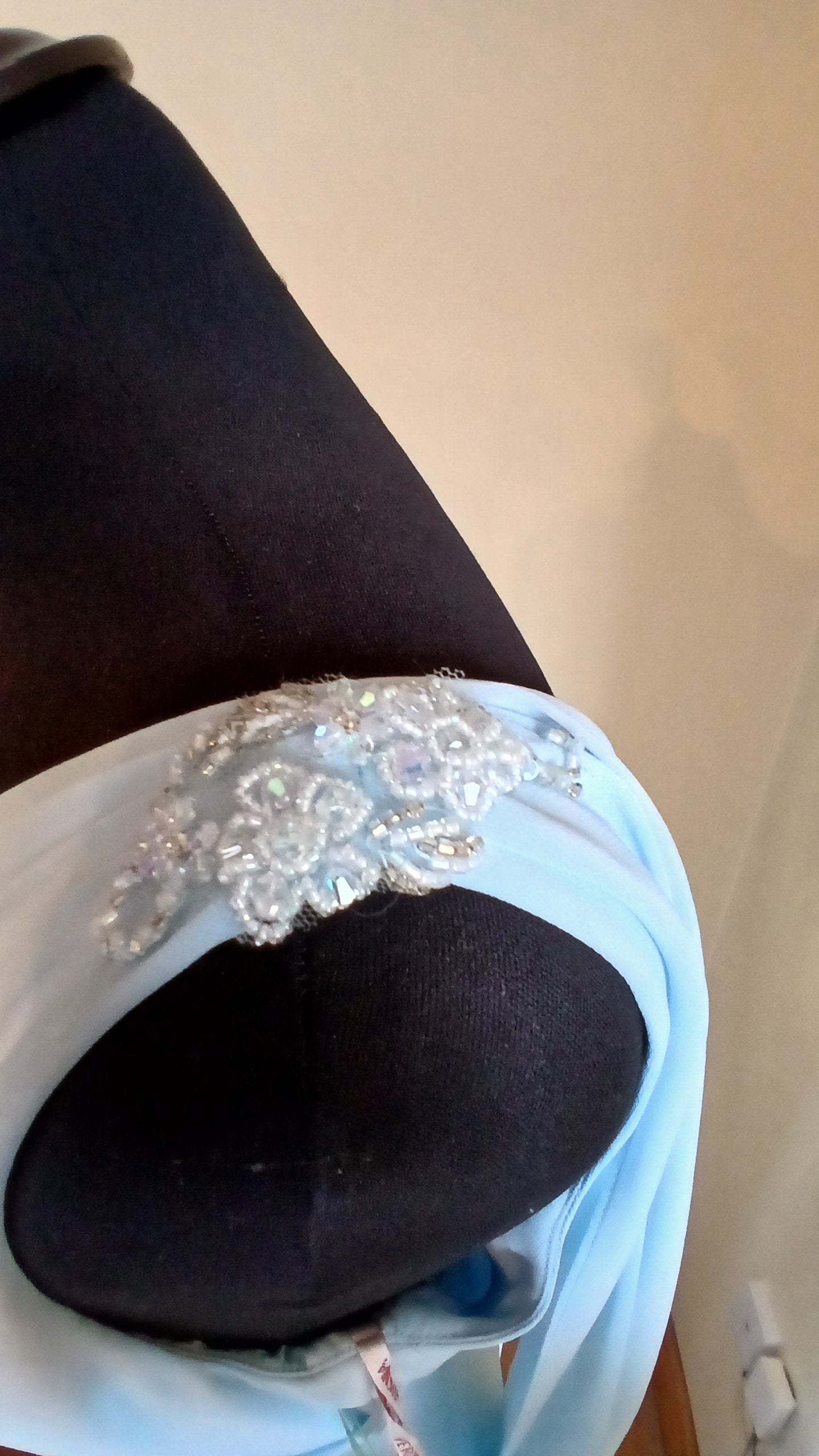 beaded motif on shoulder