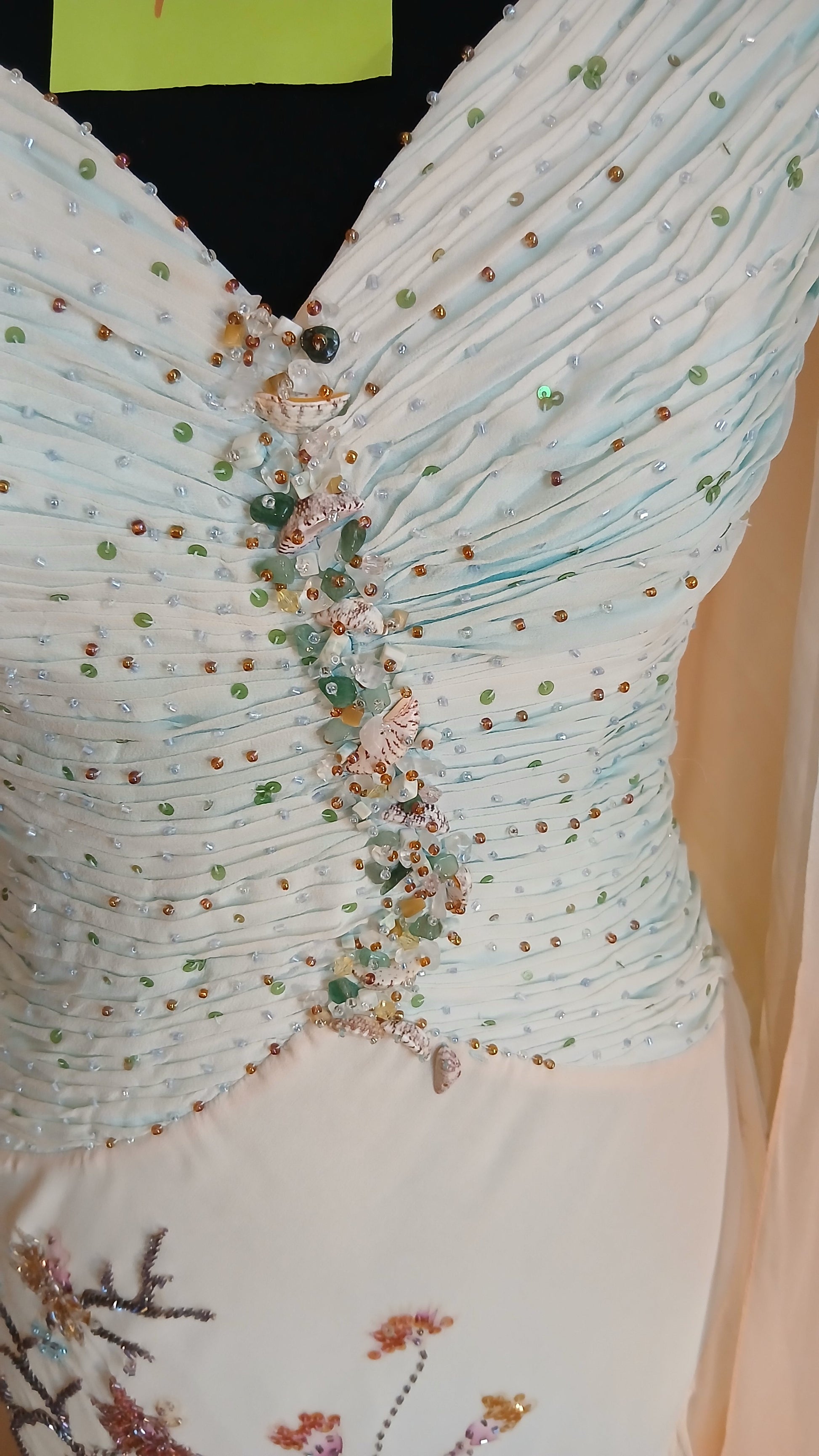 Close-up of a beaded  dress