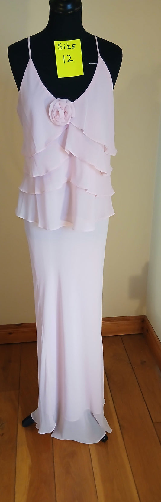 pale pink ruffled pink top and skirt