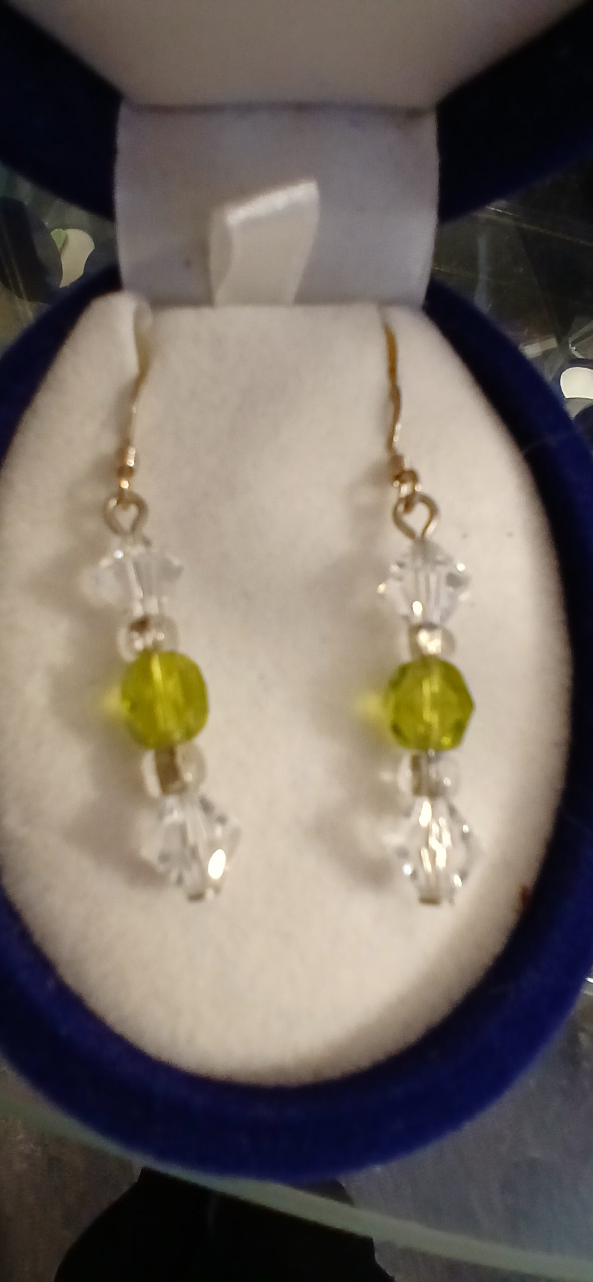Experience the luxury of our Swarovski crystals and Czech glass in peridot earrings. These elegant earrings feature sterling silver ear wires and a stunning peridot design. Perfect for those who appreciate high-quality craftsmanship and unique, eye-catching jewellery.