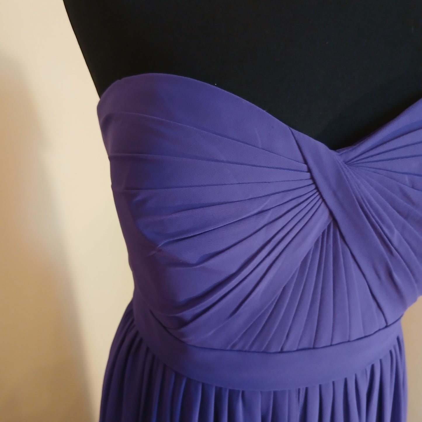 Close-up of a pleated purple fabric 