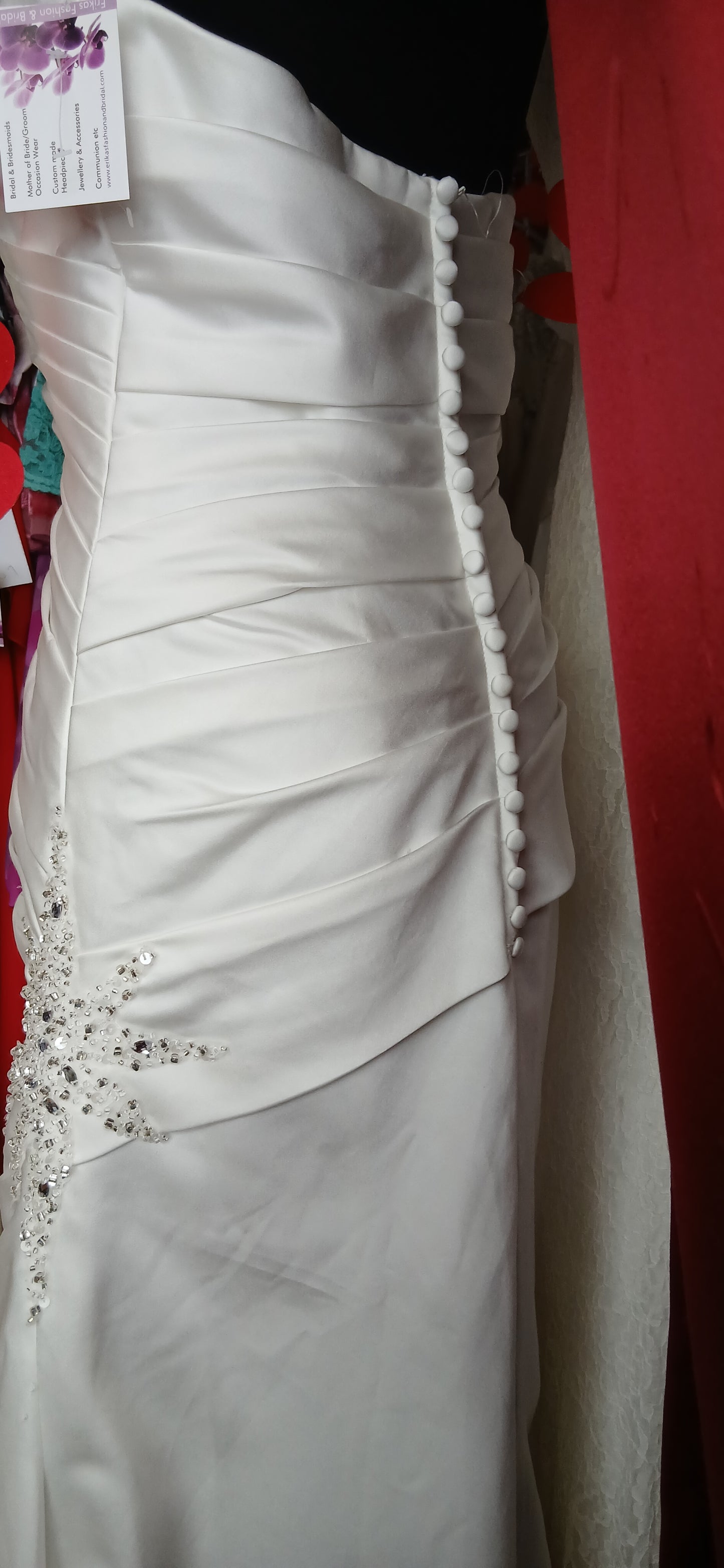 zipper back with decorative buttons